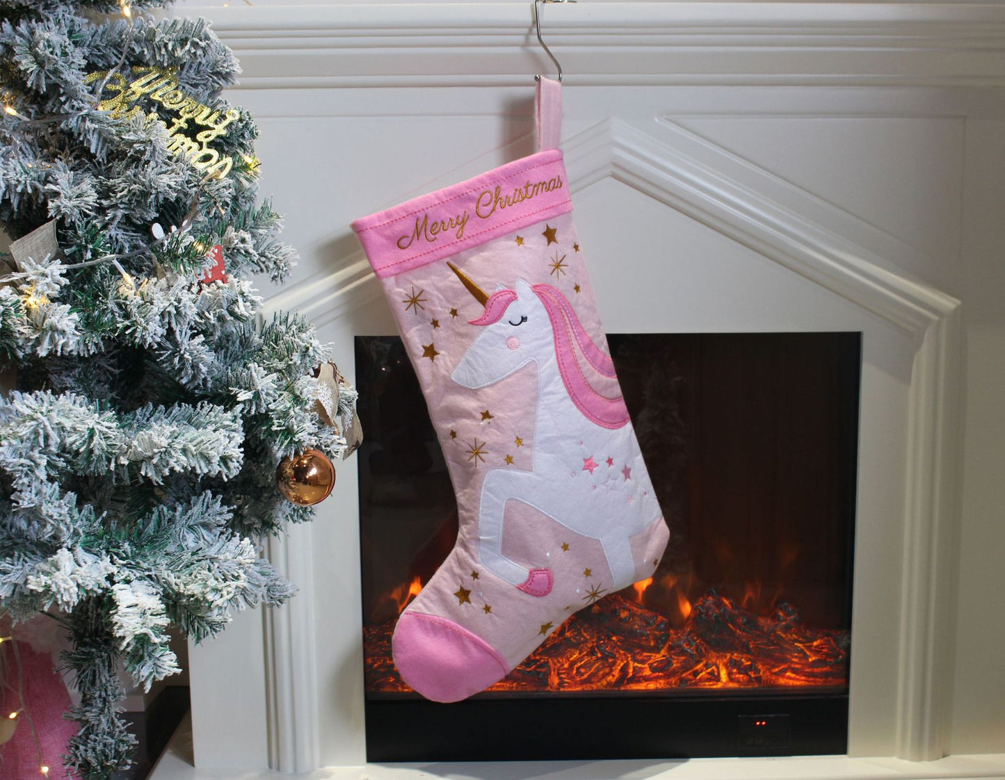 Christmas unicorn socks, Christmas tree decorations, and decorative items